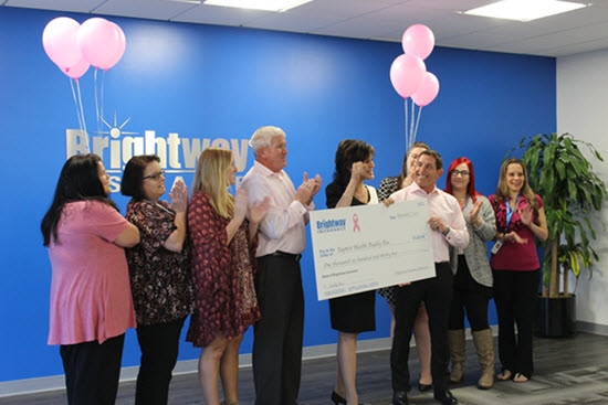 Brightway Insurance employees donate to Jacksonville-based non-profit to provide mammography services to area women
